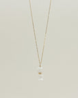 STACKED PUKA SHELL PENDENT NECKLACE