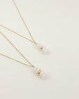 STACKED PUKA SHELL PENDENT NECKLACE